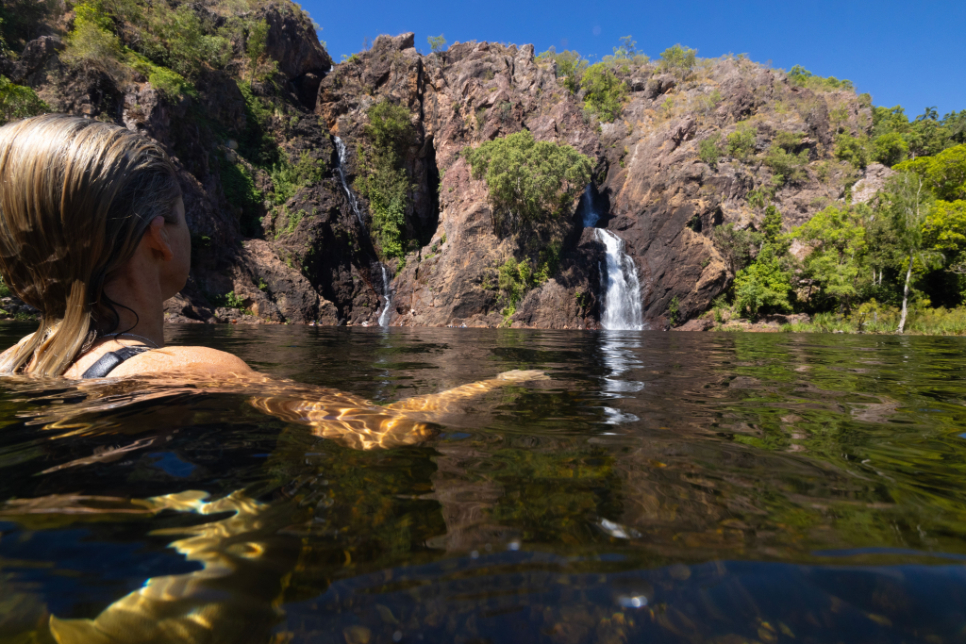 Swimming in Wangi Falls Enjoying the cool crystal clear water in Wangi Falls.